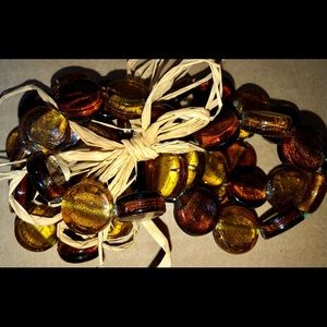 (6) Vintage Amber Glass Stretch Napkin Holders